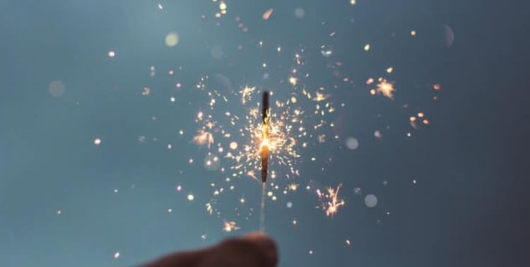 Lit sparkler emitting bright light