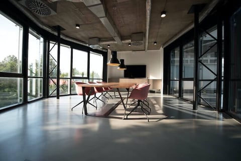 Corporate office meeting room with floor to ceiling windows