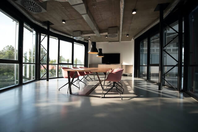 Corporate office meeting room with floor to ceiling windows